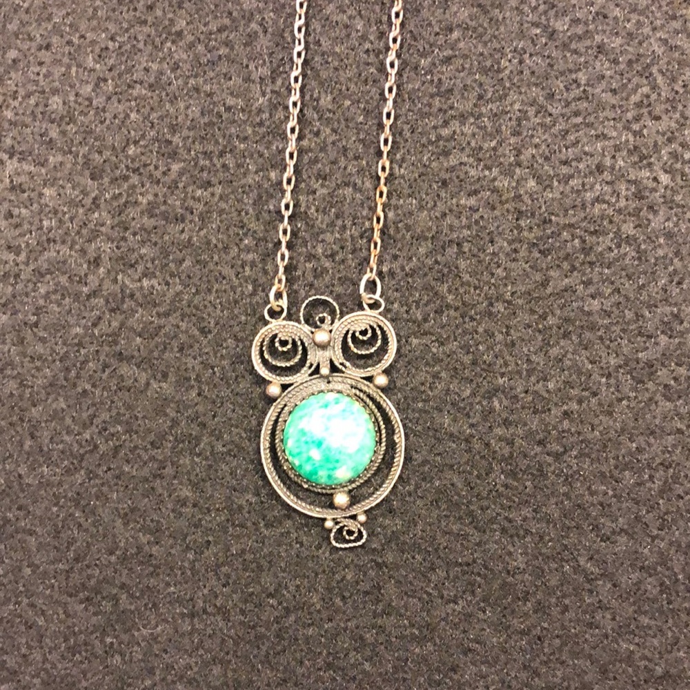 Owl with jade stone necklace